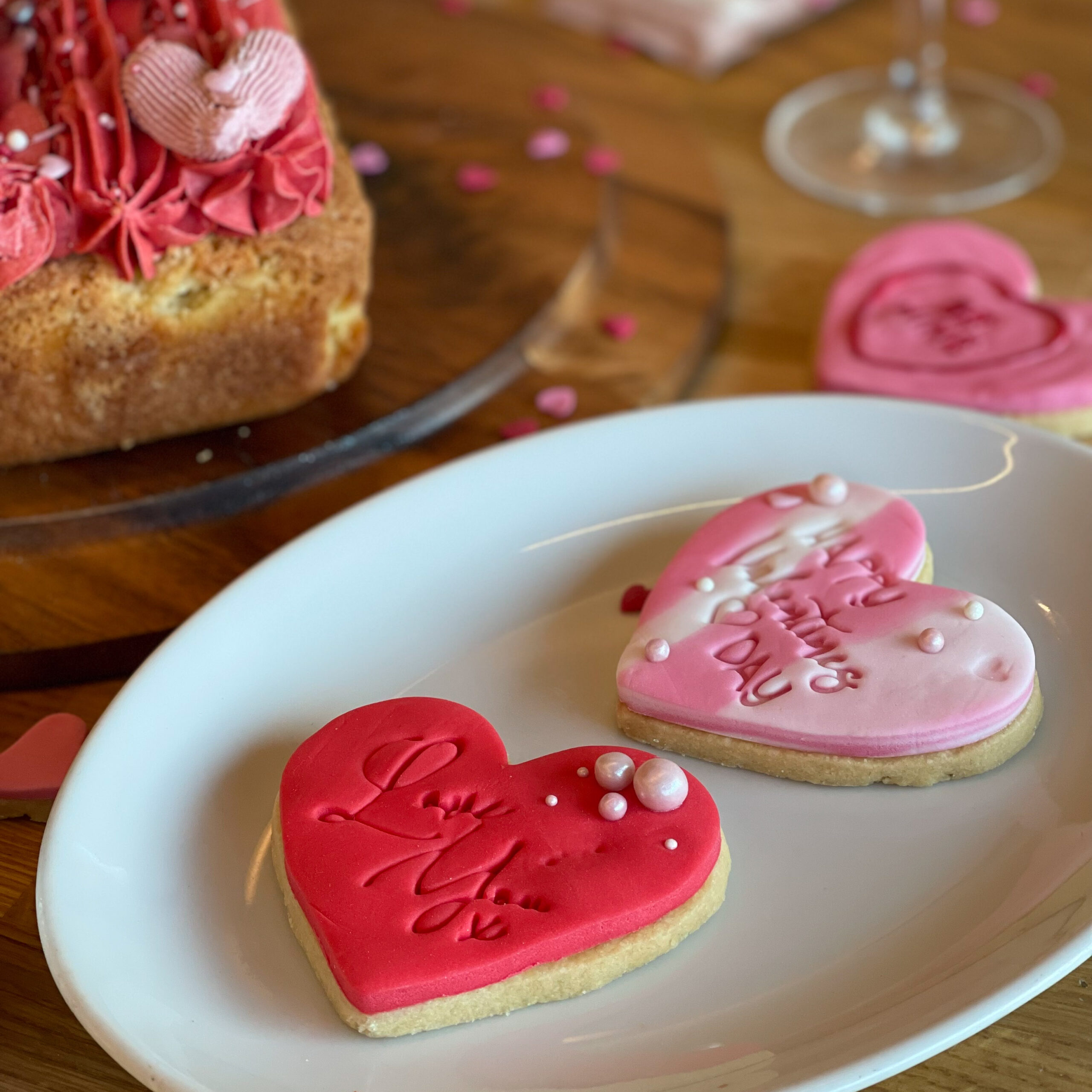 Valentine's Day pink marshmallows in a cellophane bag with black ribbon tied around the top